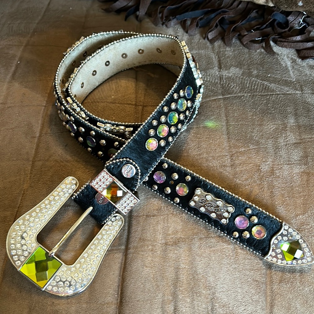Black cowhide leather bling belt. Size large. No stones missing.